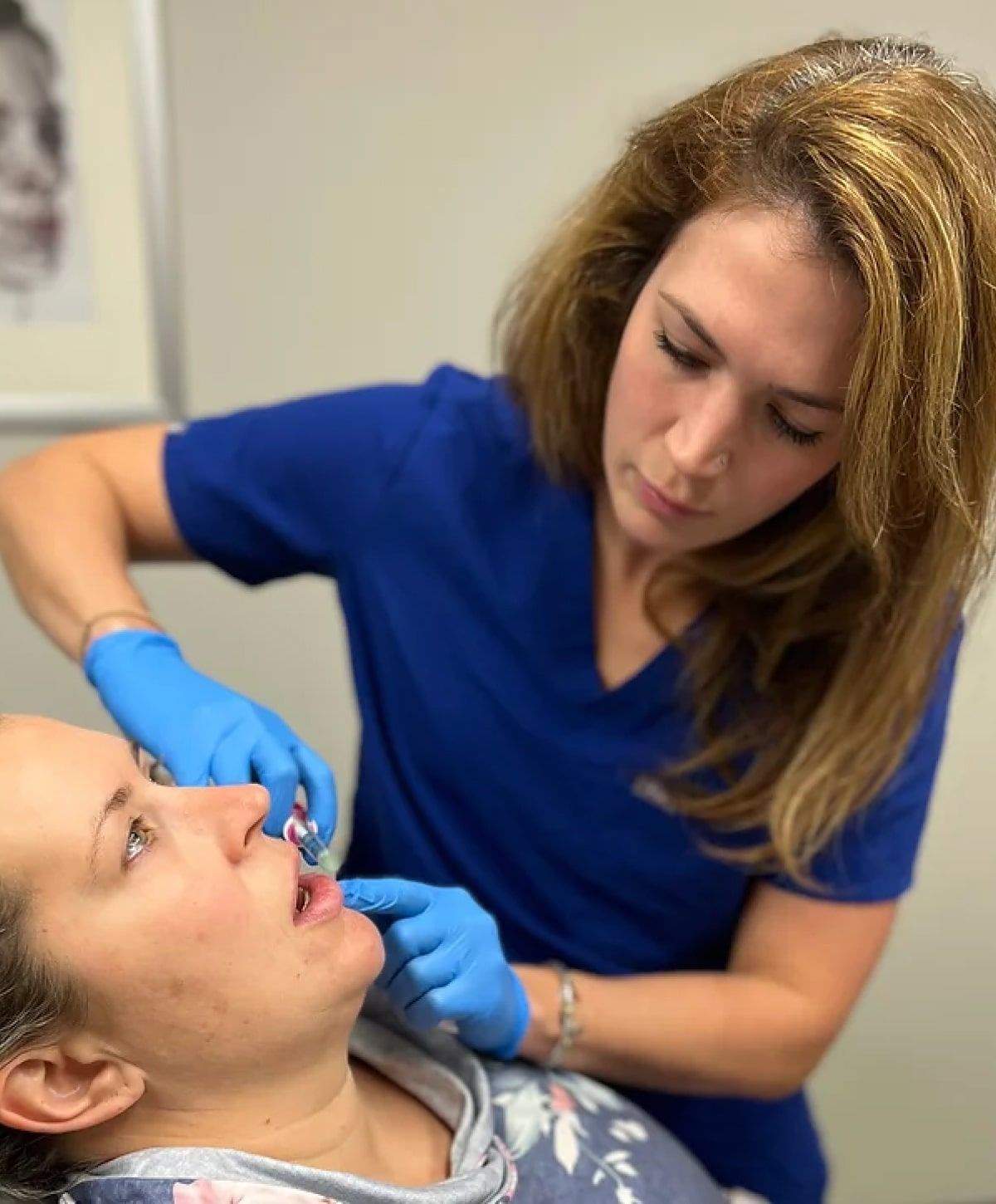 nurse injector student delivering an injectable to a patient model